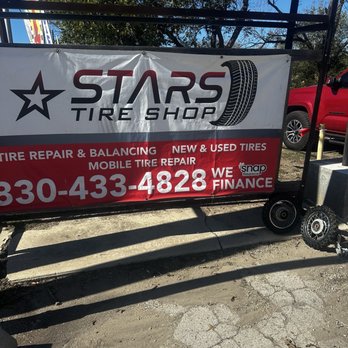 Stars Tire Shop - Damaged tires and tubes by sign. - Tires Near Me Stars Tire Shop - Damaged tires and tubes by sign. - Tires Near Me