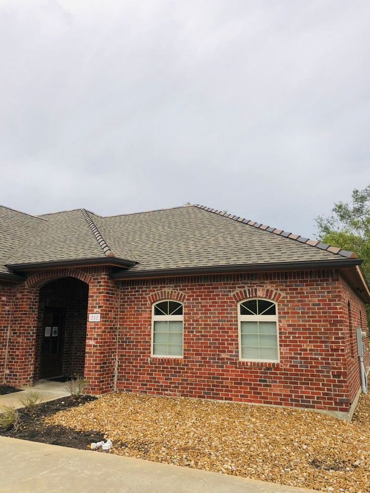 Slide of Pelican Roofing Company