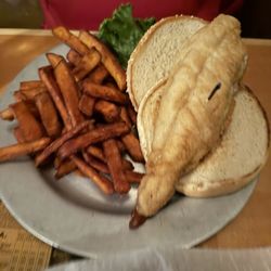 Fischer's Happy Hour Tavern - Walleye sandwich with sweet potato fries