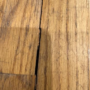 AJ Floor Service - A Before Picture:  There were gaps in our floor boards that were nicely filled and have now disappeared! - Flooring Near Me