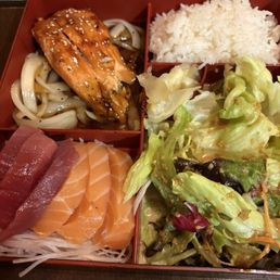 Bento box with tuna sashimi, salmon sashimi and salmon teriyaki Bento box with tuna sashimi, salmon sashimi and salmon teriyaki