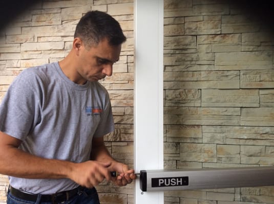 New panic hardware/Push bar install - This nw canceled vertical bar system installed on Altis apartment complex