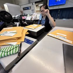 United States Postal Service - This is the lazy woman who IMMEDIATELY said she would not be able to help me because she was getting off in 6 mins.