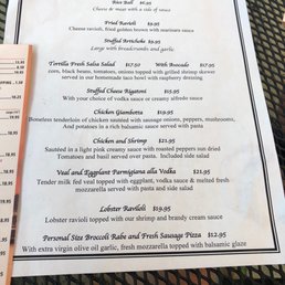 a menu for specials on a table a menu for specials on a table