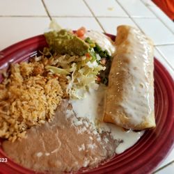 El Rey Restaurant & Cantina - OUR DELICIOUS FRIED CHIMICHANGA WITH RICE AND BEANS ON THE SIDE