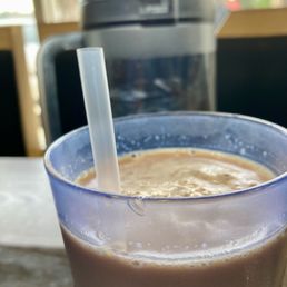 Milk Tea with water pitcher in background