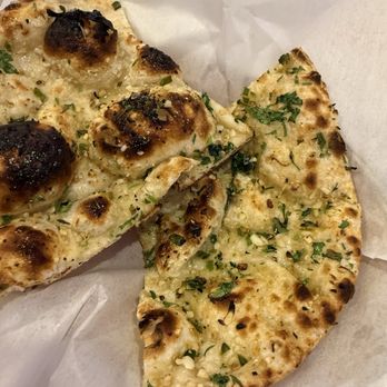 Sanjh Indian Kitchen & Bar - Bullet Naan - another one I couldn't get a picture of before half was gone. Delicious with an awesome spicy kick - Indian Near Me - Riviera Beach, Florida Sanjh Indian Kitchen & Bar - Bullet Naan - another one I couldn't get a picture of before half was gone. Delicious with an awesome spicy kick - Indian Near Me - Riviera Beach, Florida