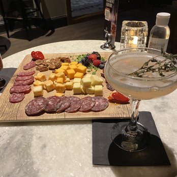 The Exchange - Plum Reader & charcuterie board - Cocktail Bars Near Me - Indianapolis, Indiana The Exchange - Plum Reader & charcuterie board - Cocktail Bars Near Me - Indianapolis, Indiana
