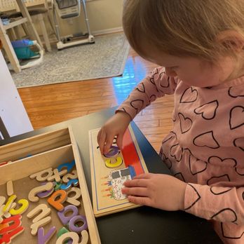 Mama Pari's Child Care - Working on letters - Child Care & Day Care Near Me