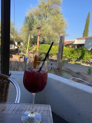 Photo of Pizzicata - Carefree, AZ, US. Sangria on the patio! Beautiful day!