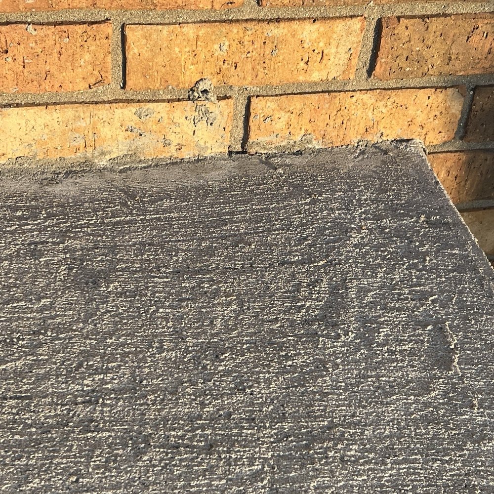 A Touch of Construction - Concrete on brick of house - Masonry/Concrete Near Me - Beloit, Wisconsin