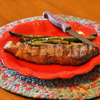 Back Forty Beef - grilled asparagus on a red plate - Meat Shops Near Me