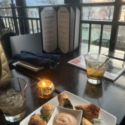 Terrace at the River Inn - Sunset over appetizers