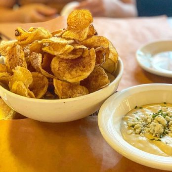 The Smith - House made potato chips with bleu cheese Fondue - New American Near Me - New York, New York The Smith - House made potato chips with bleu cheese Fondue - New American Near Me - New York, New York