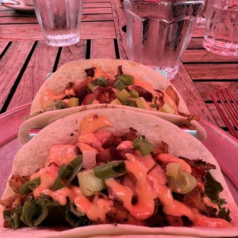 The Cottage - Chicken ponzu tacos. (Red hue from dining Al fresco with the giant red sun umbrella) - American Near Me - Lake Placid, New York The Cottage - Chicken ponzu tacos. (Red hue from dining Al fresco with the giant red sun umbrella) - American Near Me - Lake Placid, New York