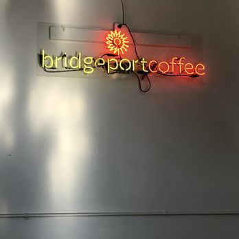 Bridgeport Coffee - a neon sign on a wall - Coffee & Tea Near Me - Chicago, Illinois Bridgeport Coffee - a neon sign on a wall - Coffee & Tea Near Me - Chicago, Illinois