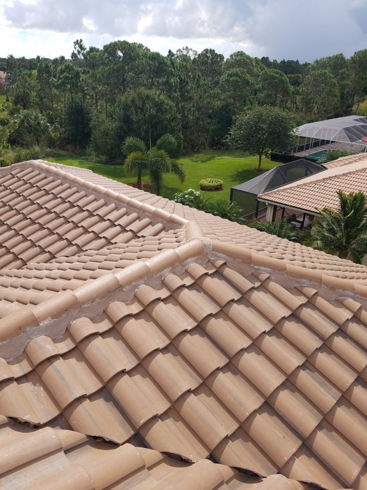Slide of All American Roofing And Coating Of Florida