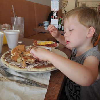Henhouse Cafe - hes enjoying it - American Near Me - Mesa, Arizona