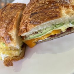Perk Coffee House - Egg & cheese croissant with avocado and bacon. Cheddar cheese for reference.