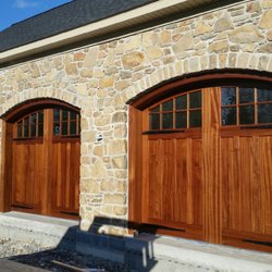 Shank Door - Custom Wood Carriage doors with arched top.