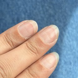 Belle Femme Nail Spa - 1 month growth on botched manicure