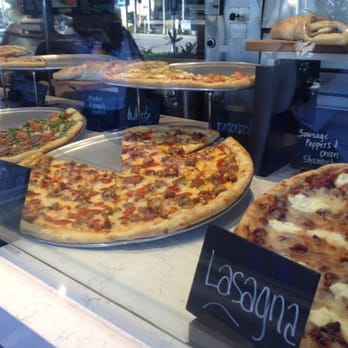 Cannoli Kitchen Pizza - Slices behind the counter - Pizza Near Me - Boca Raton, Florida Cannoli Kitchen Pizza - Slices behind the counter - Pizza Near Me - Boca Raton, Florida
