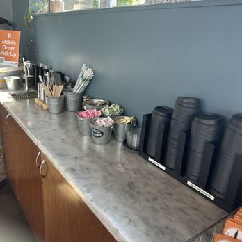 Caffe Ladro - Issaquah - Condiment and drink counter. - Coffee & Tea Near Me - Issaquah, Washington