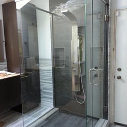 A Mirror Image - Frameless Heavy Glass Three Panel Shower Enclosure.