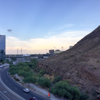 AC Hotel Phoenix Tempe/Downtown - Daytime view from the rooftop lounge facing east with Sun Devil Stadium peaking out behind Hayden Butte - Hotels Near Me - Tempe, Arizona