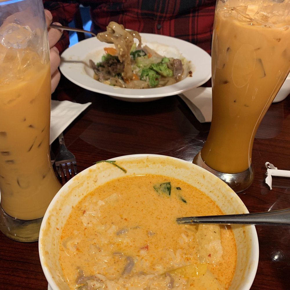 Royal Thai - Gang Kua (pineapple curry) with beef, Lad Nar with beef, and Thai iced tea. - Thai Near Me - Anchorage, Alaska Royal Thai - Gang Kua (pineapple curry) with beef, Lad Nar with beef, and Thai iced tea. - Thai Near Me - Anchorage, Alaska