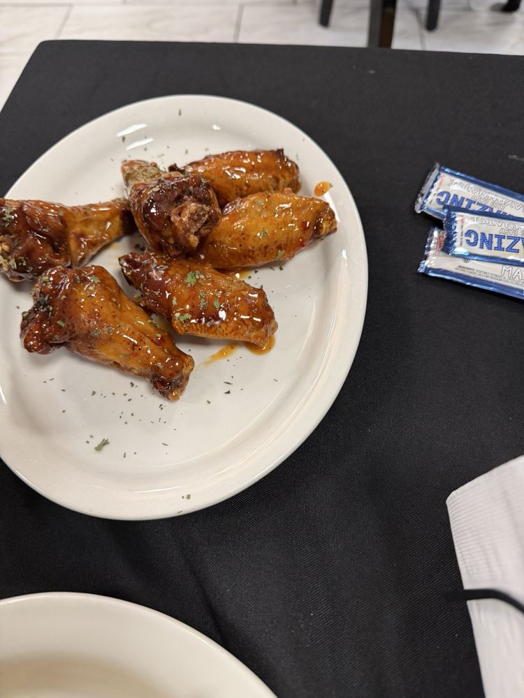 Brittany's Restaurant and Lounge Logo