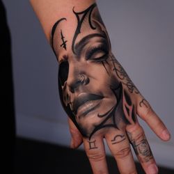 Custom hand tattoo