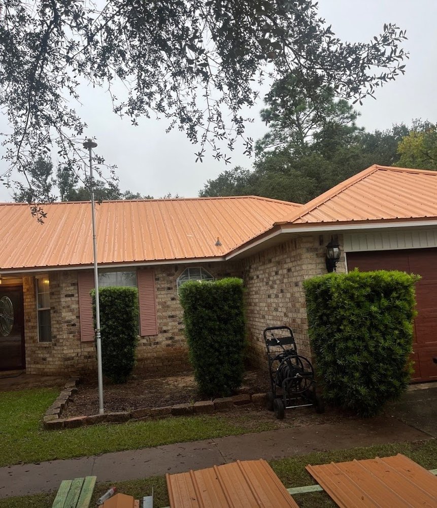 Slide of H.E. Roberts Roofing