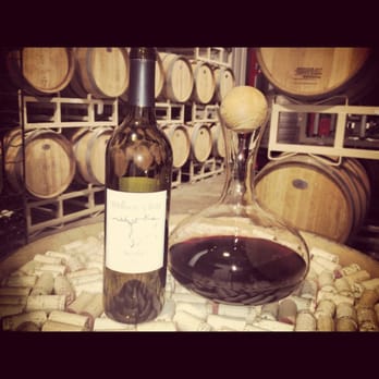 William Chris Vineyards - The winery and a great bottle of Merlot - Wineries Near Me - Hye, Texas