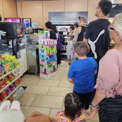 Lining up for a free Slurpee!