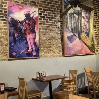 Snug Harbor Jazz Bistro - Art decor sitting area - Jazz & Blues Near Me - New Orleans, Louisiana