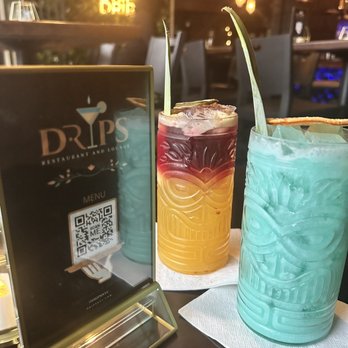 Drips Restaurant and Lounge - The blueish one is the "Montego Bay" a mix of creamy rummy goodness. Outstanding presentation and atmosphere. Good Vibes!!! - Lounges Near Me - Bronx, New York Drips Restaurant and Lounge - The blueish one is the "Montego Bay" a mix of creamy rummy goodness. Outstanding presentation and atmosphere. Good Vibes!!! - Lounges Near Me - Bronx, New York