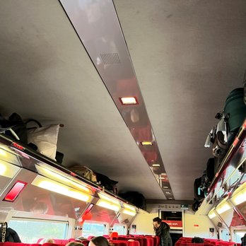 Thalys - Inside of train with overhead bins - Trains Near Me - Brussels, BRU