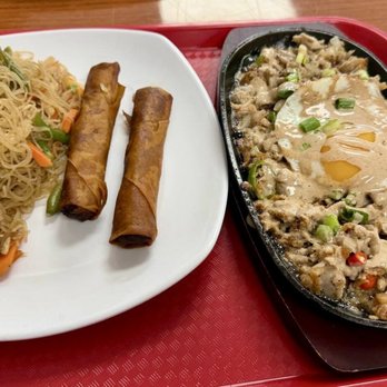Malou's Kusina - Sizzle Pig (Sisig) with egg, pancit and Shanghai lumpia. - Filipino Near Me - Madison, Alabama