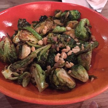 Eureka! - Crispy Glazed Brussel Sprouts with Herb Oil and Macadamia Nuts - American Near Me - Berkeley, California