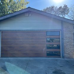 Garage Doors By Atkins & Co. - Cedar flush with tinted glass, Starting @ $3200