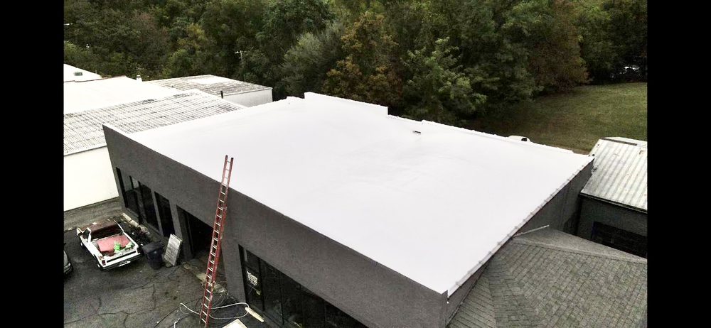 Slide of Sky Shield Roofing & Construction