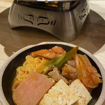 Dolpan Seoul BBQ - a bowl of food on a table - Korean Near Me - Richmond, British Columbia