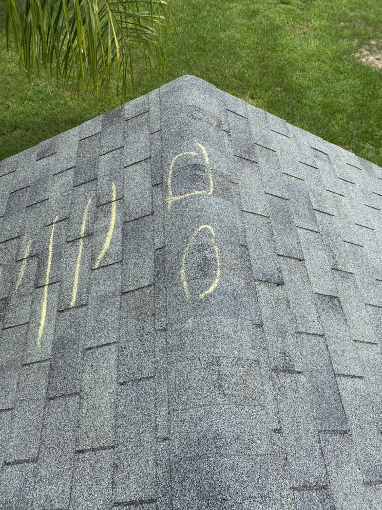 Slide of The Roofing Experts