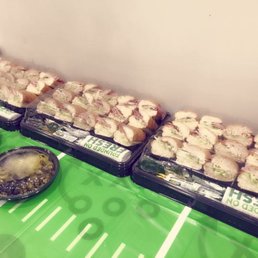 a table full of sandwiches and salads a table full of sandwiches and salads