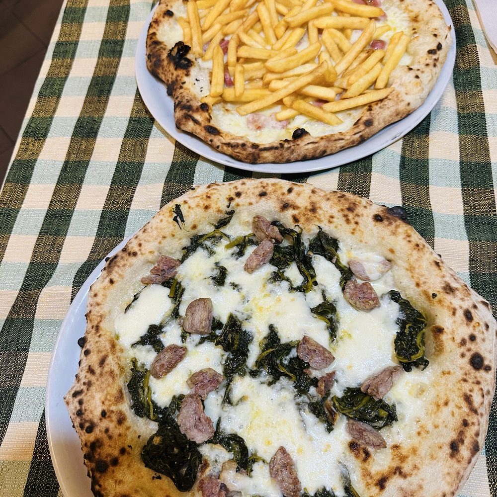 Hosteria Toledo - French fry & Hotdog pizza, Sausage & broccoli rabe pizza - Italian Near Me - Naples, NA Hosteria Toledo - French fry & Hotdog pizza, Sausage & broccoli rabe pizza - Italian Near Me - Naples, NA
