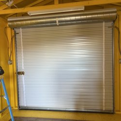 Garage Doors Of Alaska - Extra security for a fair booth