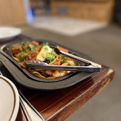 Kalia Indian Cuisine - Chicken tikka.  Sizzling platter with spiced chicken and caramelized onions.