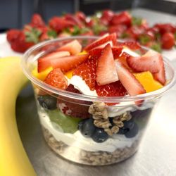 Foxy's Waffle Bar and Sugar Den - Fresh fruit bowl with granola and whip cream added.