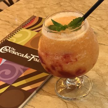 The Cheesecake Factory - Peach daiquiri type drink - it was so so so good! - Desserts Near Me - Madison, Wisconsin The Cheesecake Factory - Peach daiquiri type drink - it was so so so good! - Desserts Near Me - Madison, Wisconsin